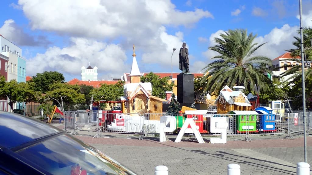 Brightly colored Dutch colonial townhouses lining the waterfront of Willemstad in Curacao