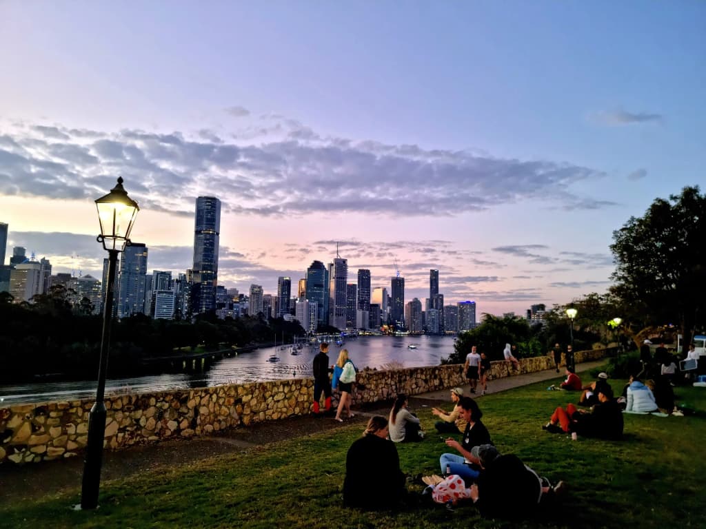 City lights reflecting off the river in Brisbane city center