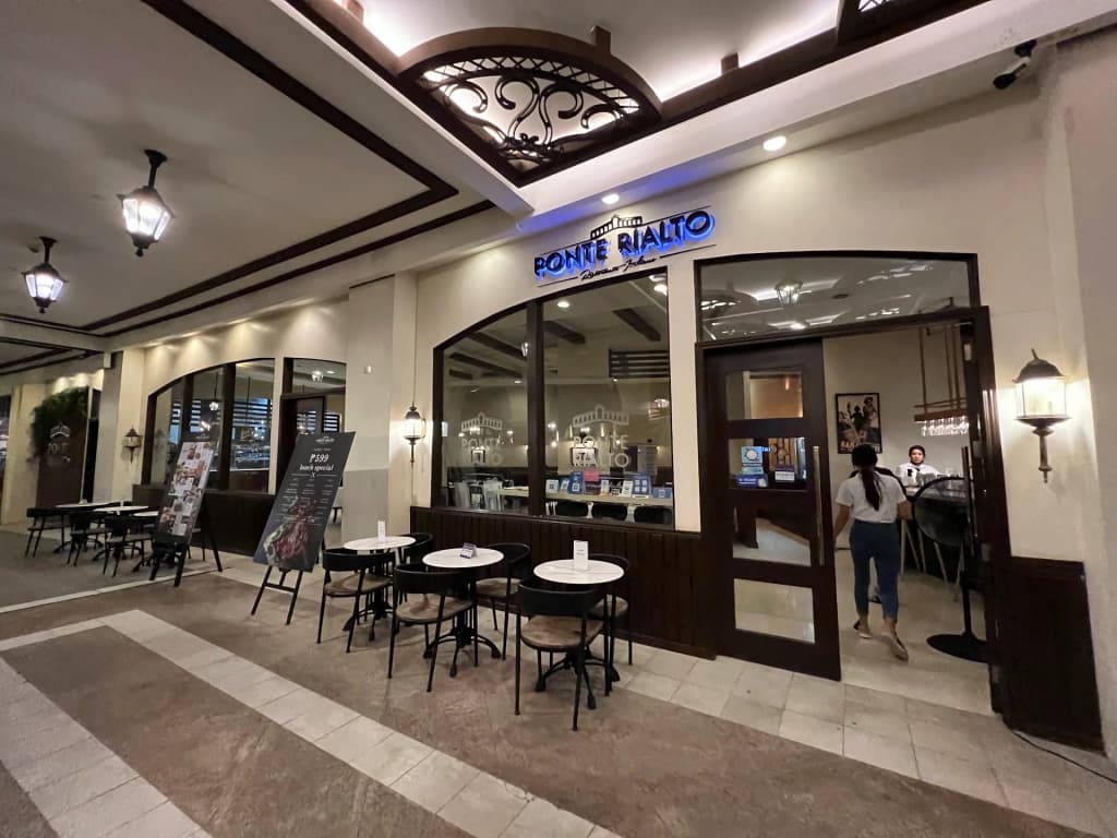 Gondolas navigating the Venice Grand Canal