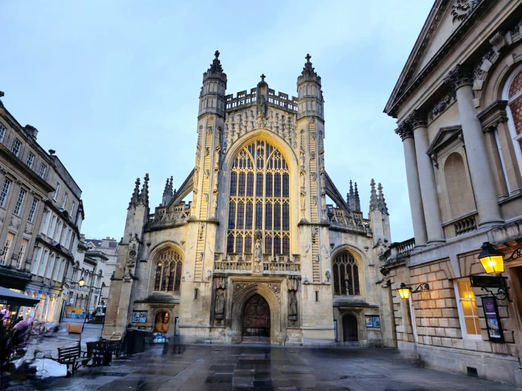 The towering Gothic architecture of Bath Abbey standing proudly in the city center