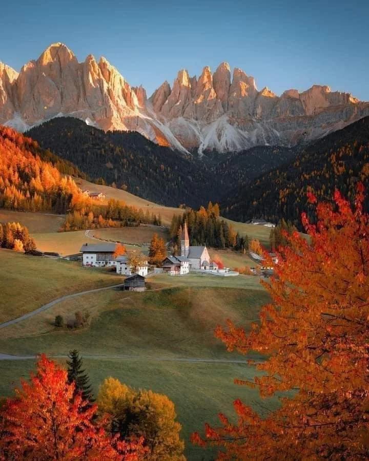 Jagged limestone peaks of the Dolomites piercing the clouds