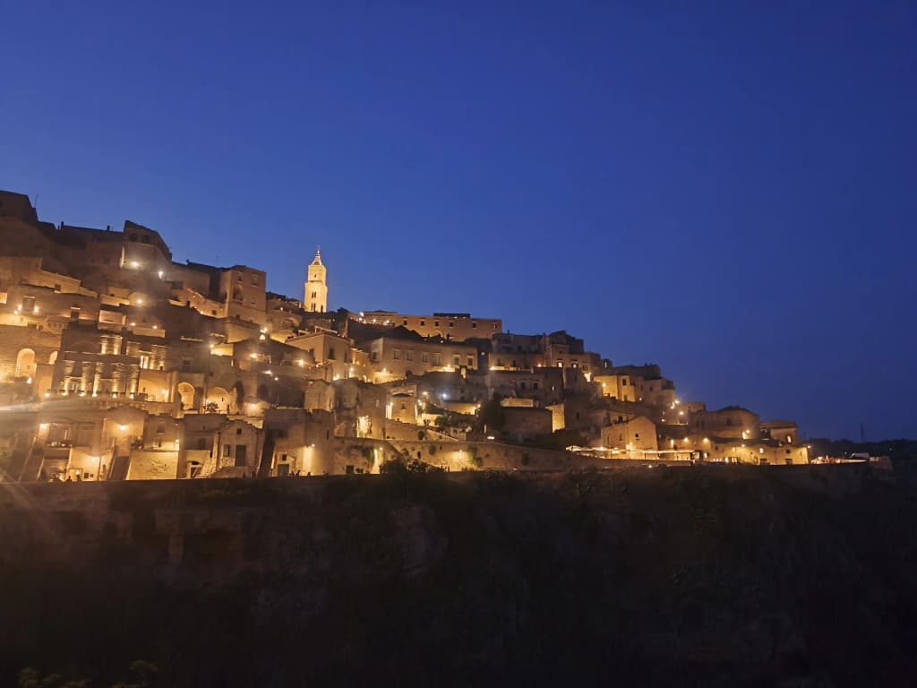 Ancient stone cave dwellings carved into the ravines of Matera