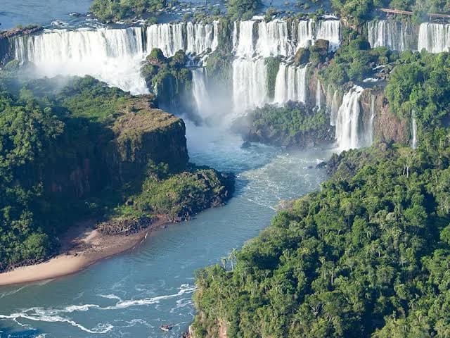 Massive water flow plunging into the narrow gorge at Victoria Falls