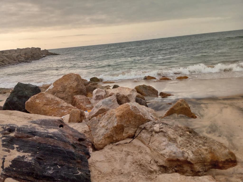 Energetic beach scenes at Ilha de Luanda