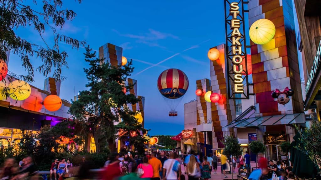 The lively nighttime atmosphere of Disney Village