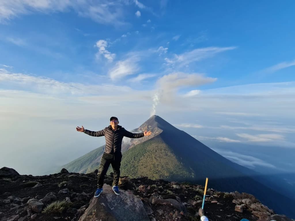 Acatenango volcano trail with clouds and hikers