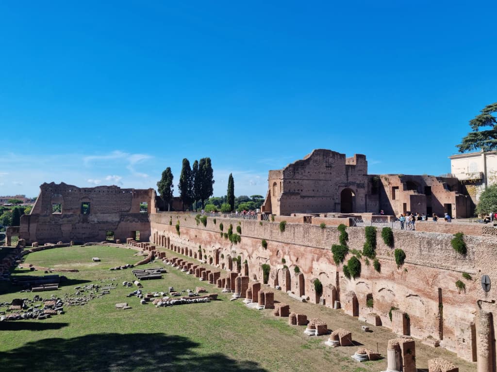 Lush greenery and ancient ruins atop Palatine Hill