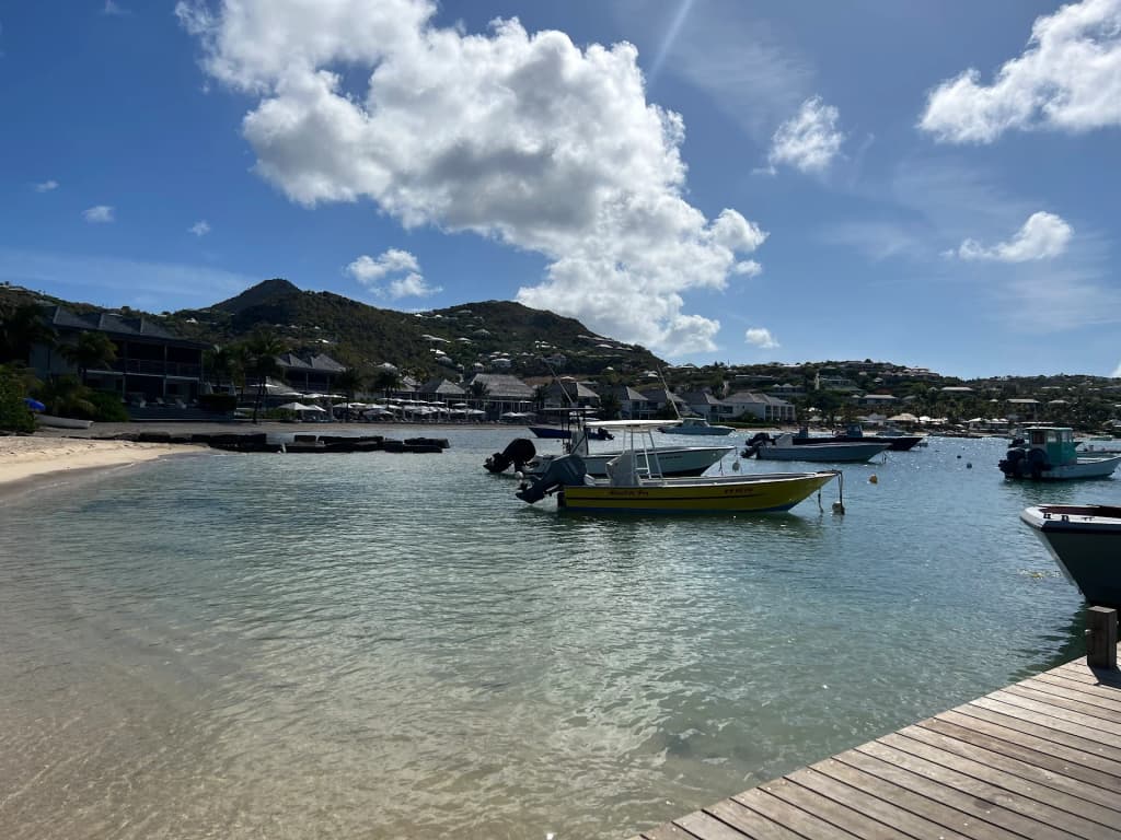 Kitesurfers catching the trade winds across the bay