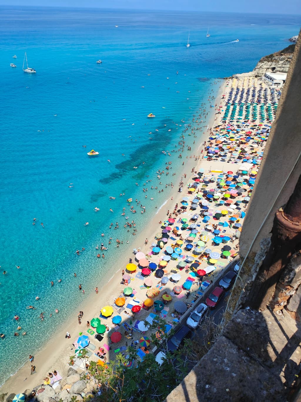 Tropea Beach cliffs and turquoise water - Photo by Matteo Fabbri