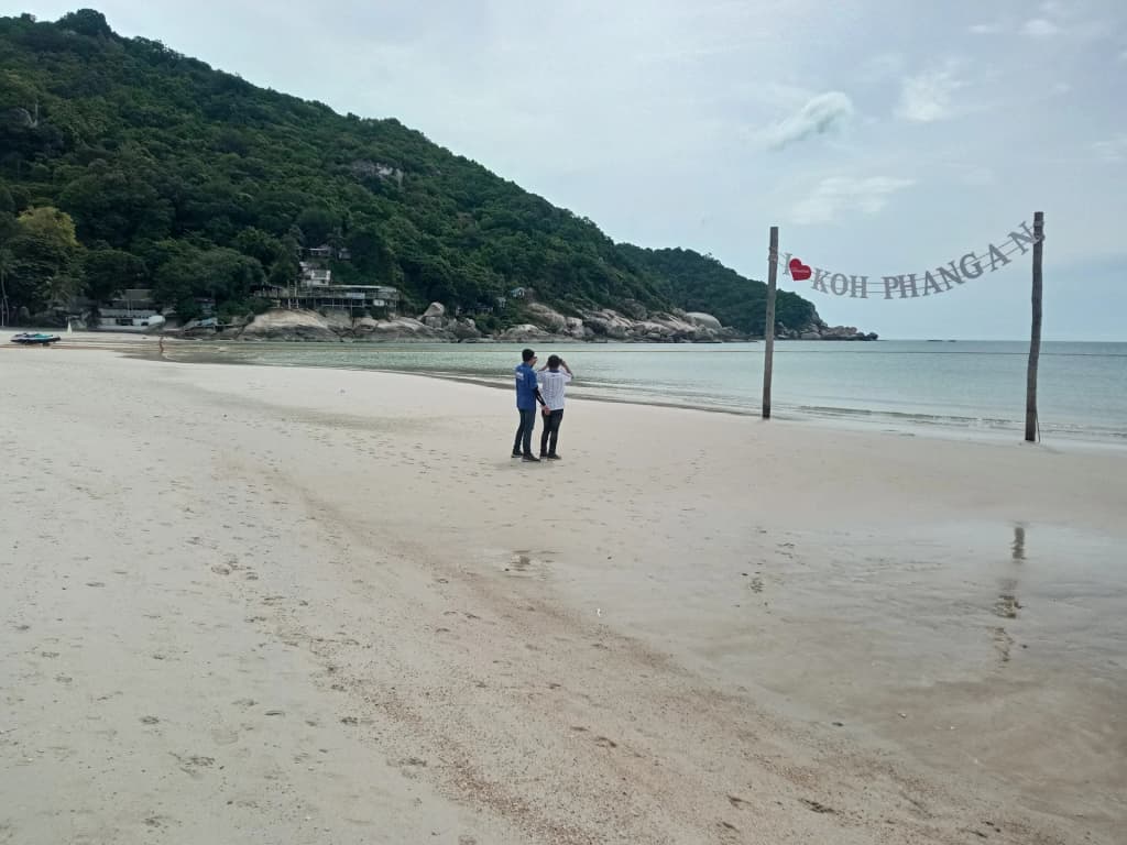 Neon lights and fire shows at the legendary Full Moon Party in Koh Phangan