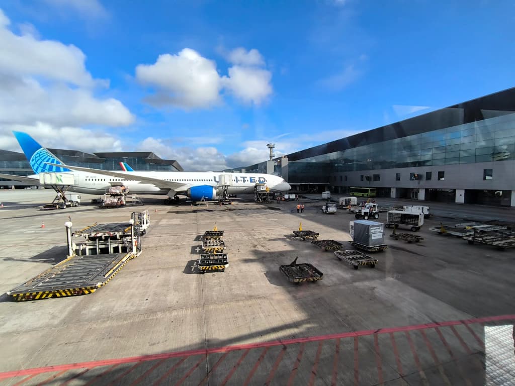 Travelers navigating the busy terminal at Guarulhos International Airport