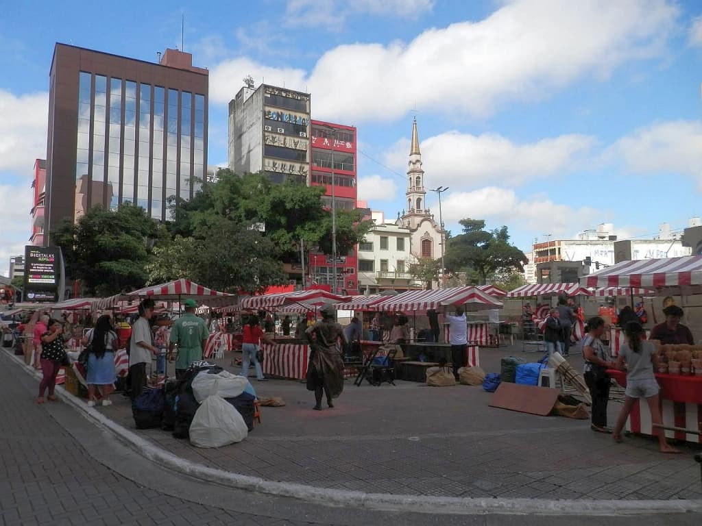 Red lanterns glow over the crowded street market in Liberdade, São Paulo