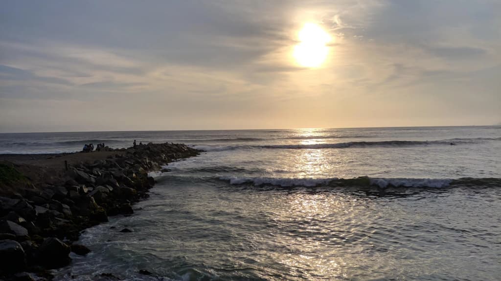 The dramatic cliffs of Costa Verde curve along the Pacific coastline