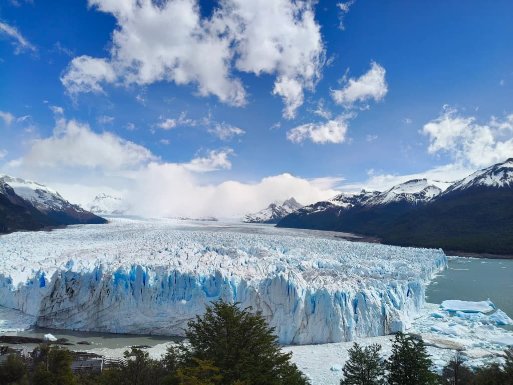 Massive ice walls of the Perito Moreno Glacier crashing into the water