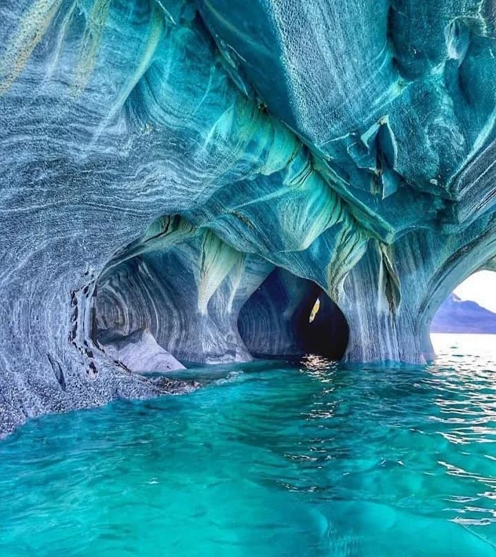 Swirling turquoise patterns inside the Marble Caves of Chile