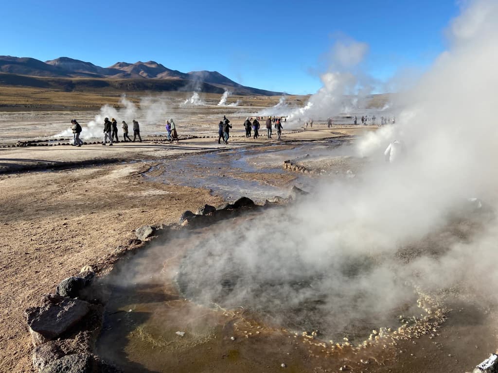 Billowing steam at the El Tatio Geysers before sunrise
