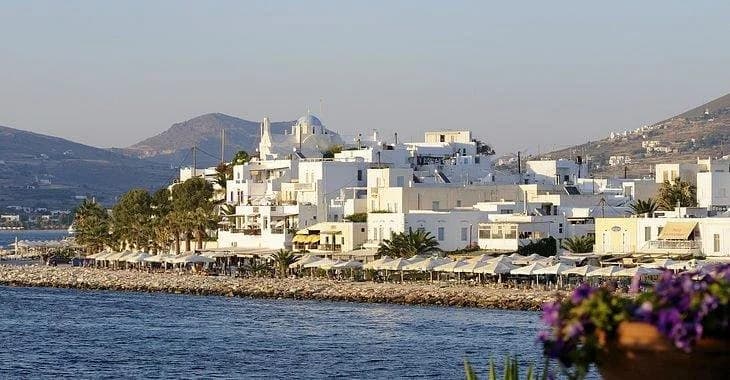 Traditional stone-paved pathways winding through the charming villages of Paros