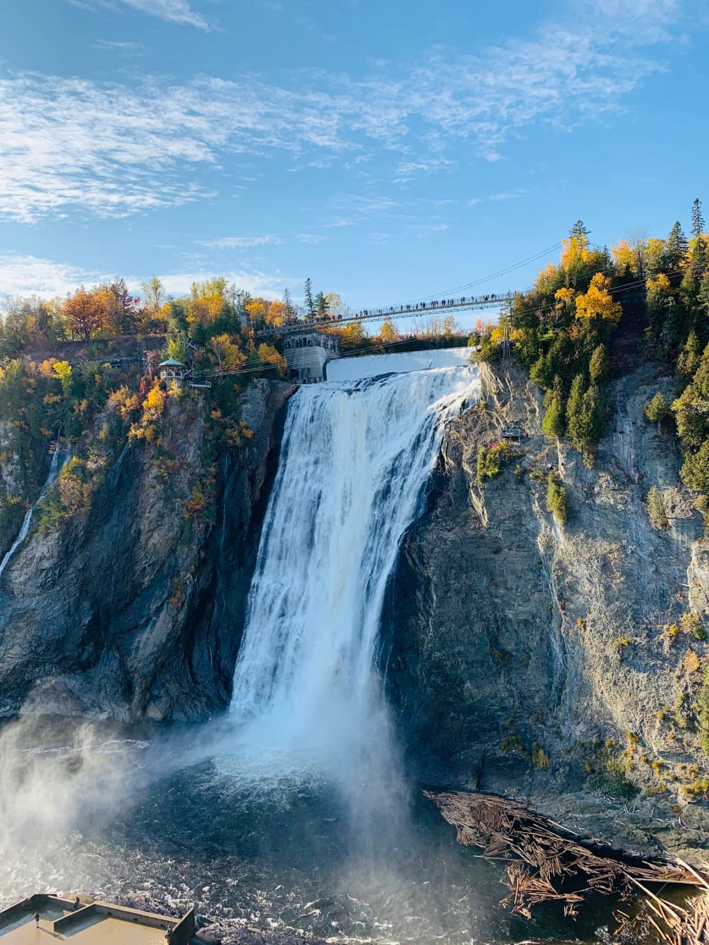 The powerful rush of water plunging down Montmorency Falls