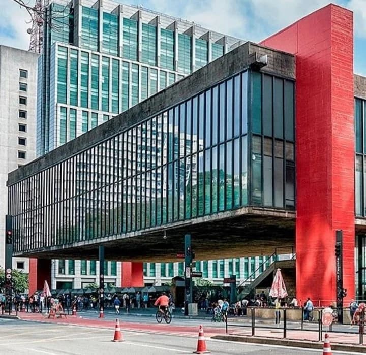 The striking red pillars and suspended architecture of the MASP Museum in São Paulo