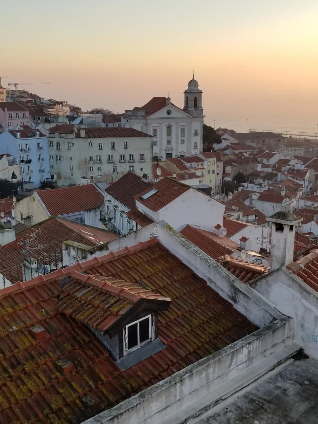 Winding cobblestone streets of the ancient Alfama district in Lisbon