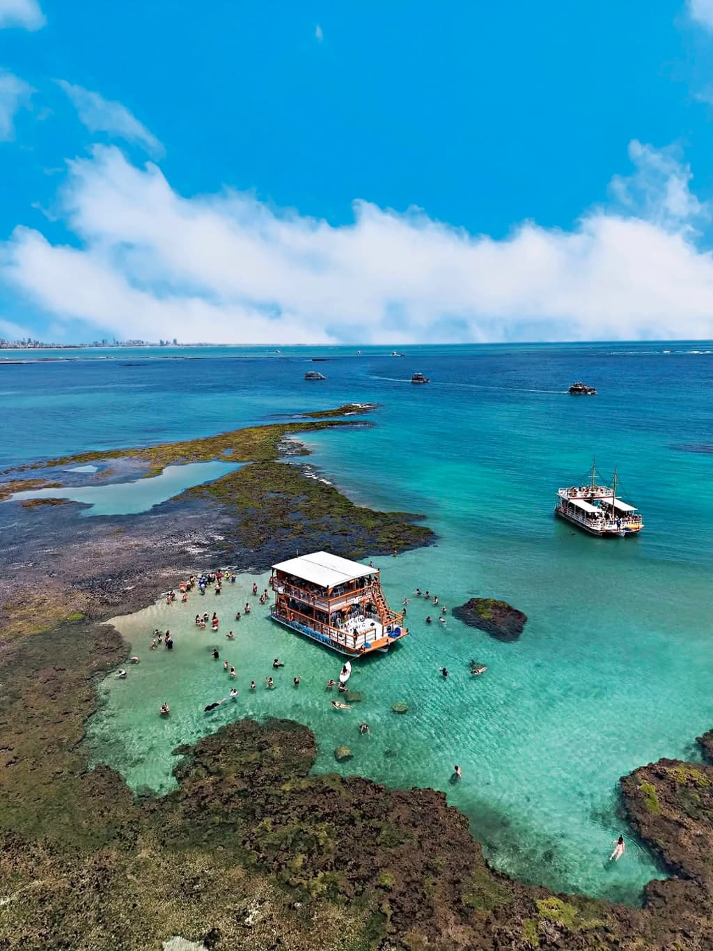 Catamaran boats at Piscinas Naturais do Seixas