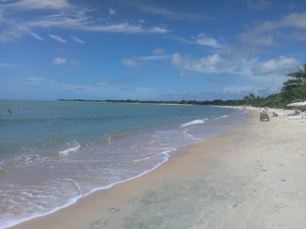 Calm waters perfect for families at Praia do Mutá