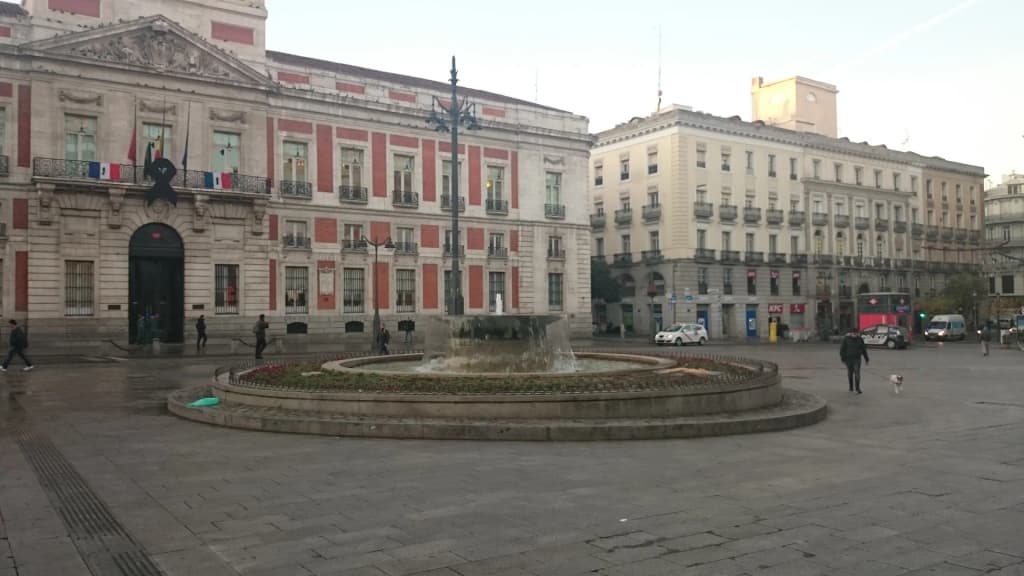 The bustling atmosphere of Puerta del Sol