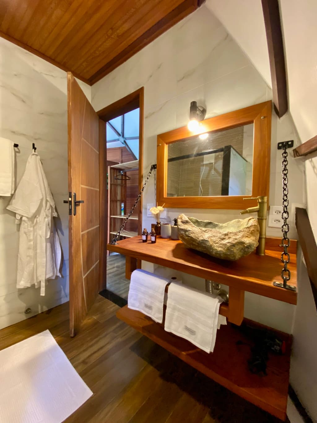 Cozy interior of Domo Brisa Boa with bed, sofa, and kitchen