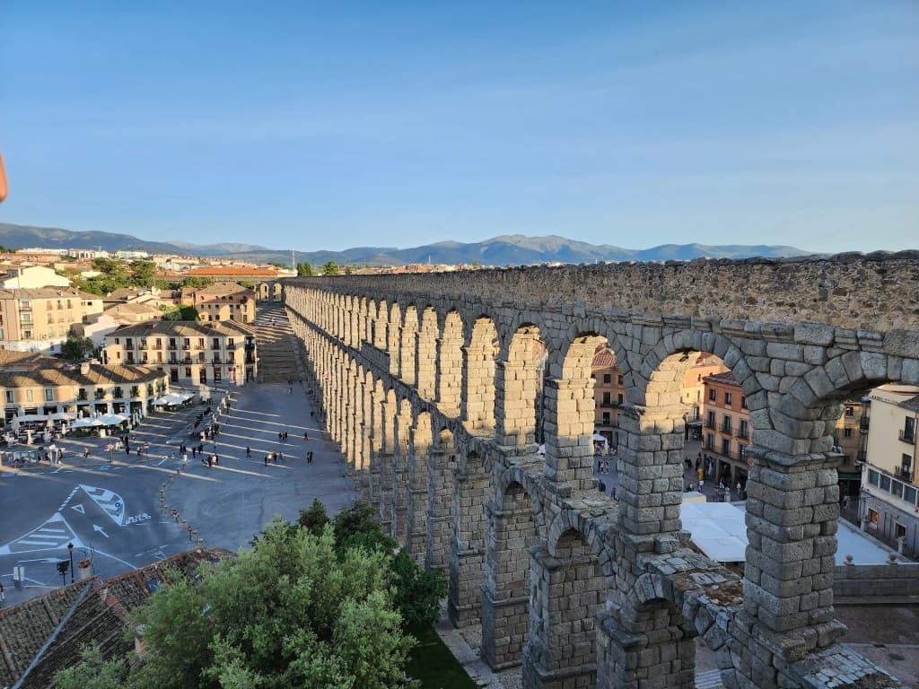 Detailed view of the aqueduct construction against a blue sky