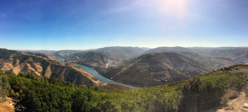 The bustling riverfront and historic architecture of Peso da Régua