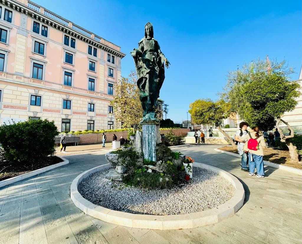 Gondolas resting quietly on the emerald waters of Venice