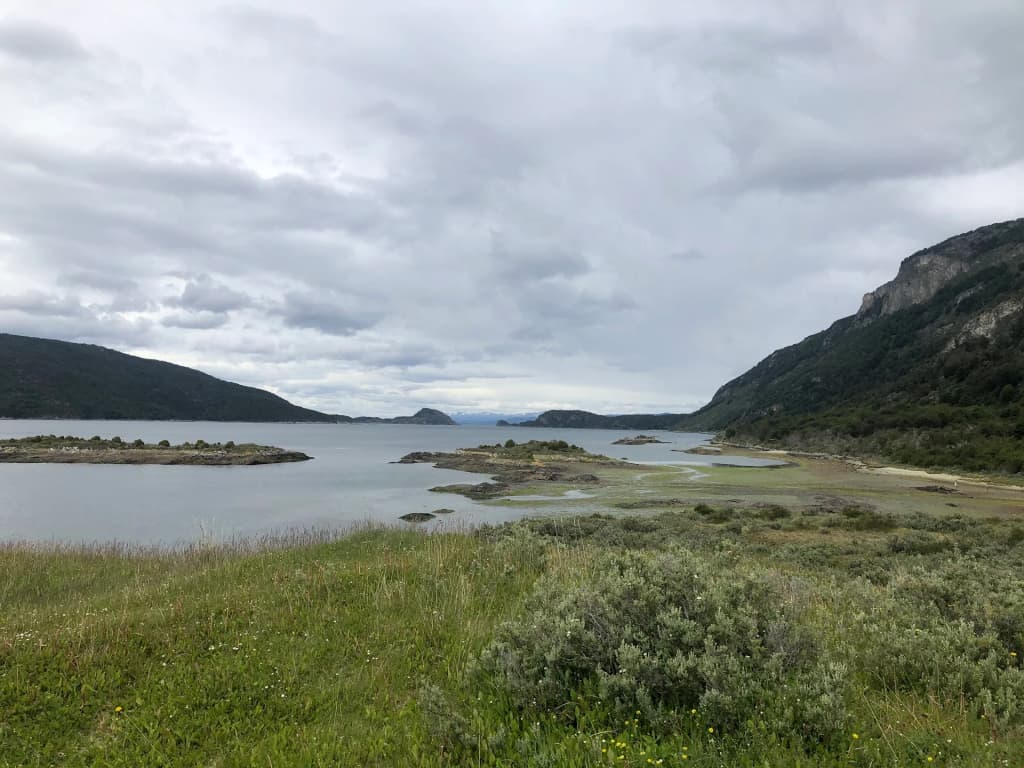 The rugged coastline and distant mountains of Lapataia Bay in Tierra del Fuego