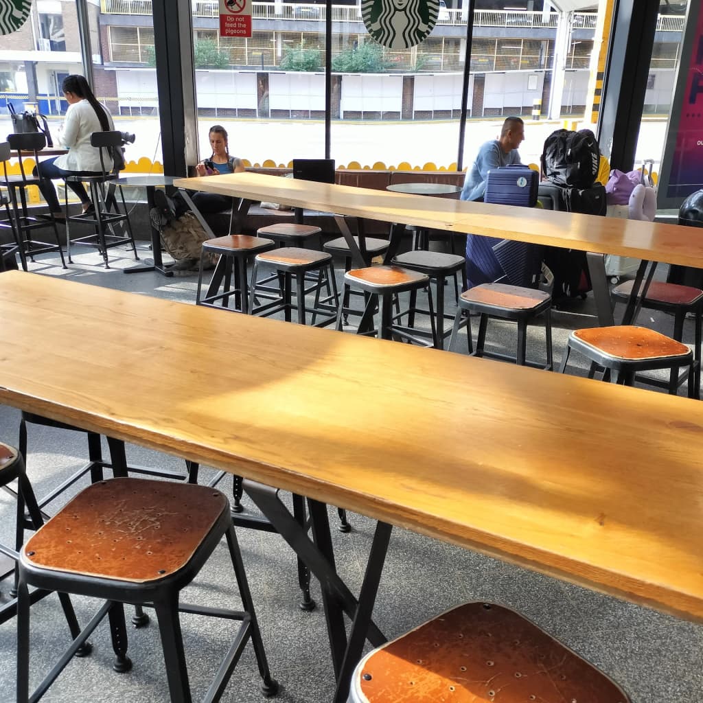 Channel ferry interior, packed with travelers