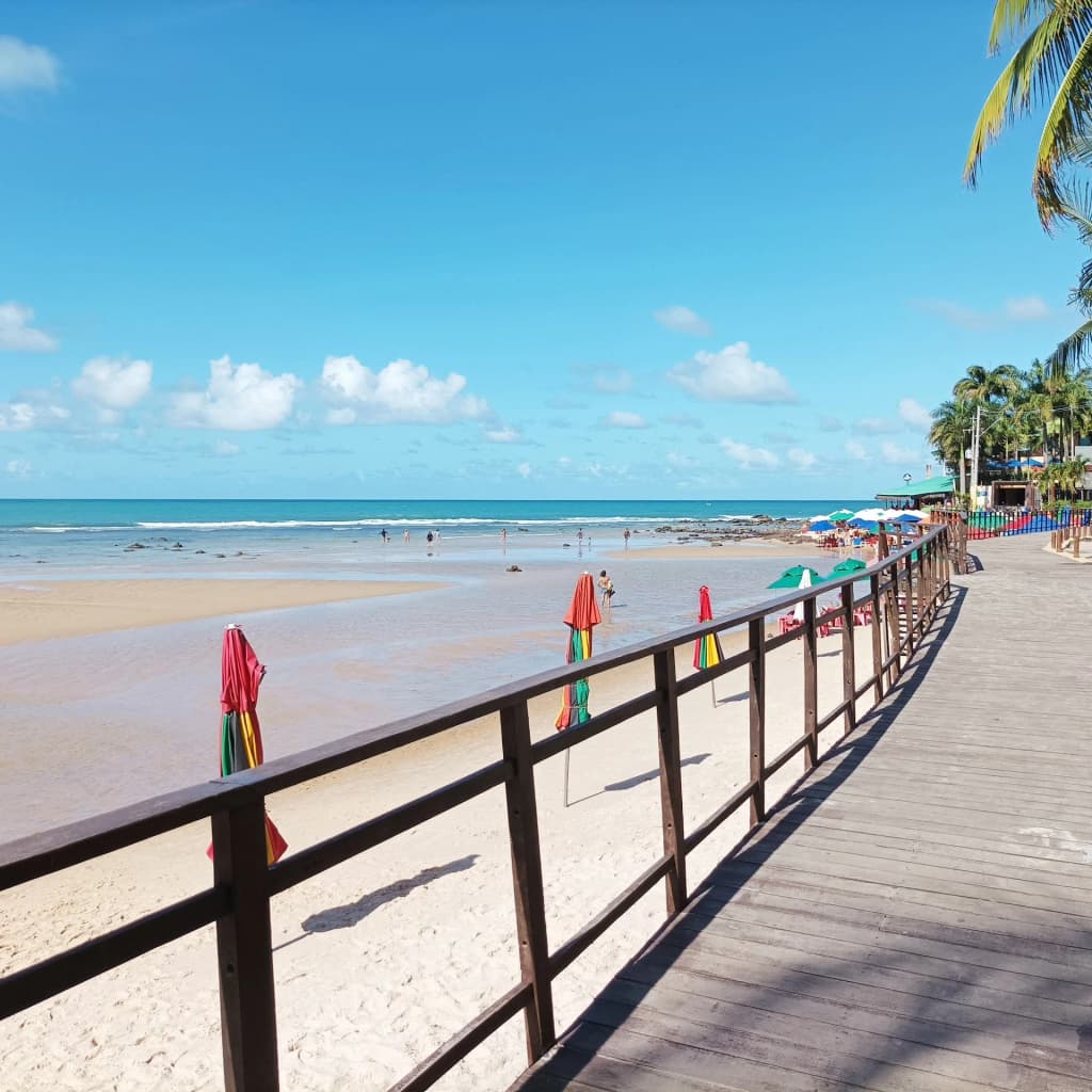 Golden hour lighting over the cliffs of Pipa Beach
