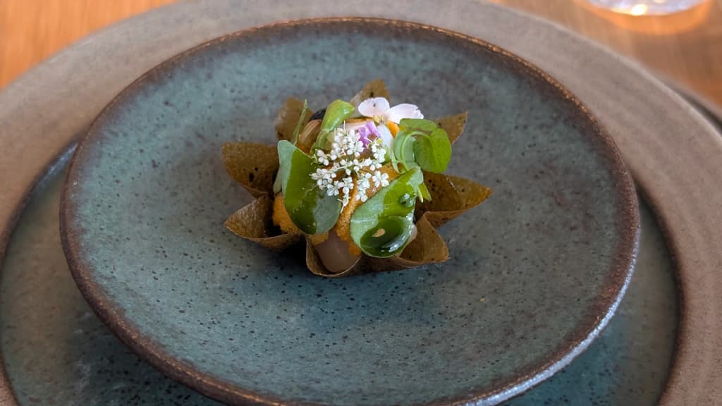 Exquisite Michelin-starred culinary presentation at PAZ in the Faroe Islands