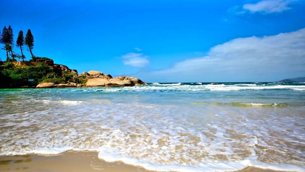 Las dunas de Joaquina a lo lejos