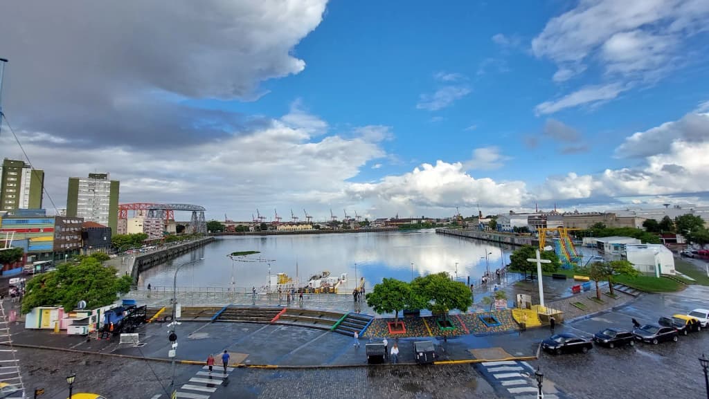 Brightly painted corrugated iron buildings lining the gritty streets of La Boca