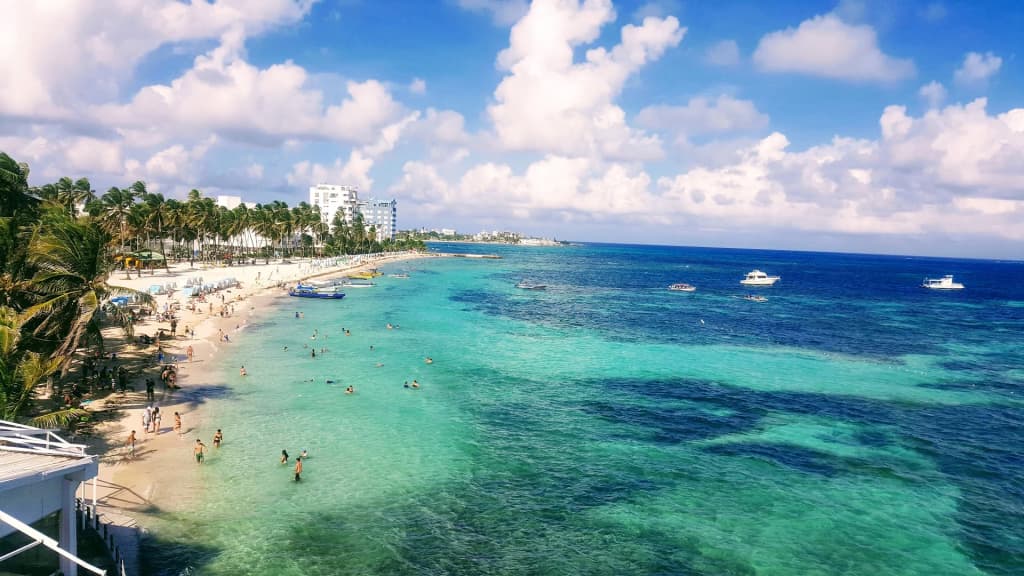 The lively beachfront and calm waters of Playa Spratt Bight
