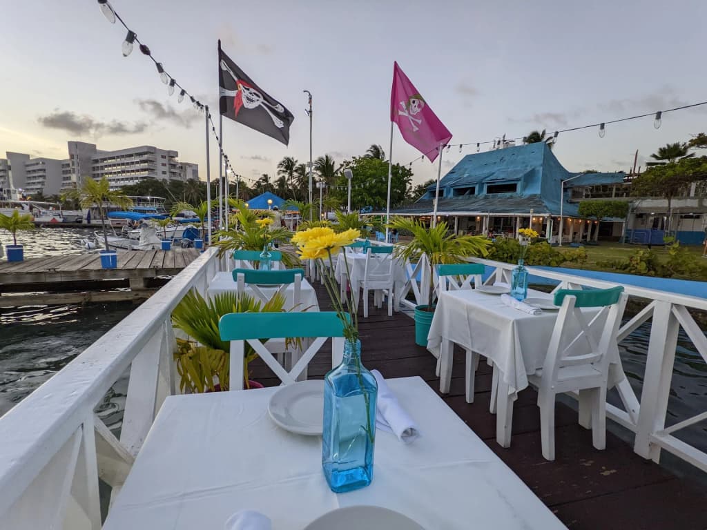 The colorful, eclectic waterfront exterior of La Regatta restaurant