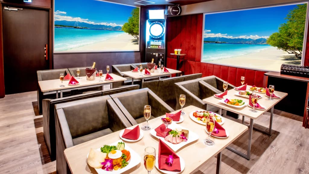 A glowing touch screen tablet used for ordering food and selecting songs