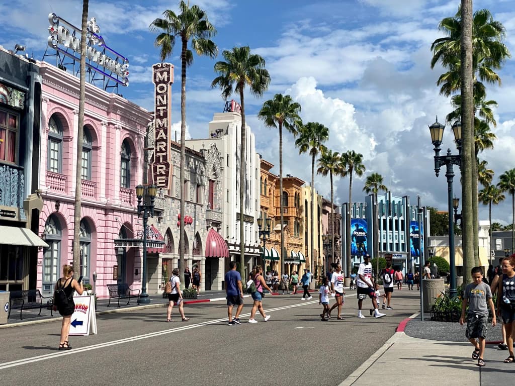 The iconic globe at Universal Studios Florida surrounded by eager morning crowds