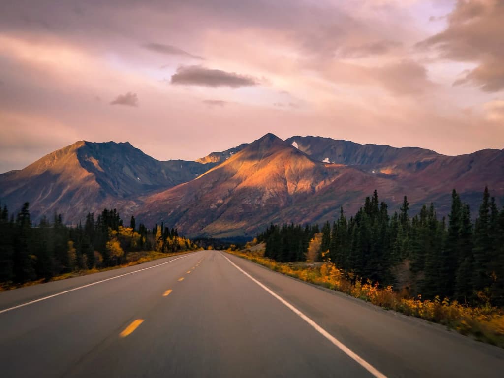 River flowing through the Alaskan wilderness - Photo by Brian
