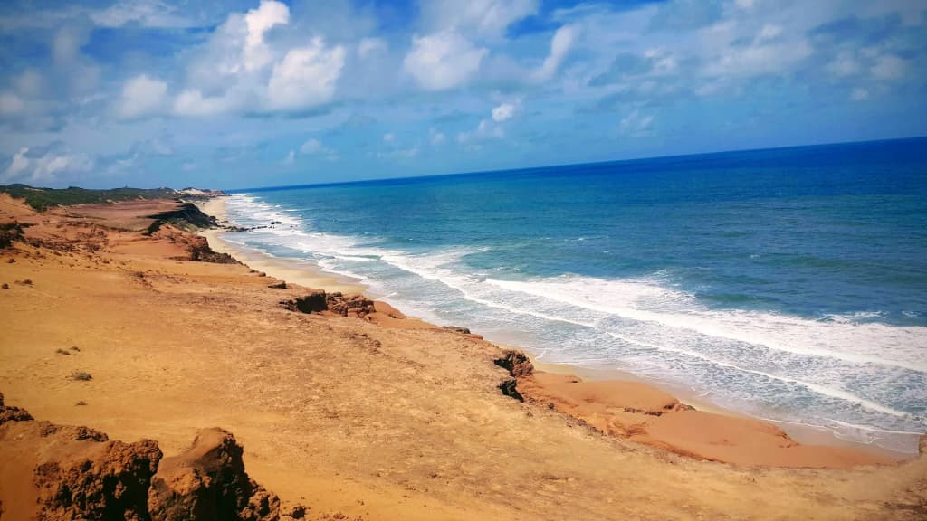 Dramatic cliffs and warm waters at Pipa Beach
