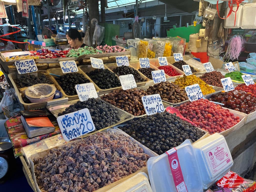 Crowds gathering on the tracks at Maeklong Railway Market