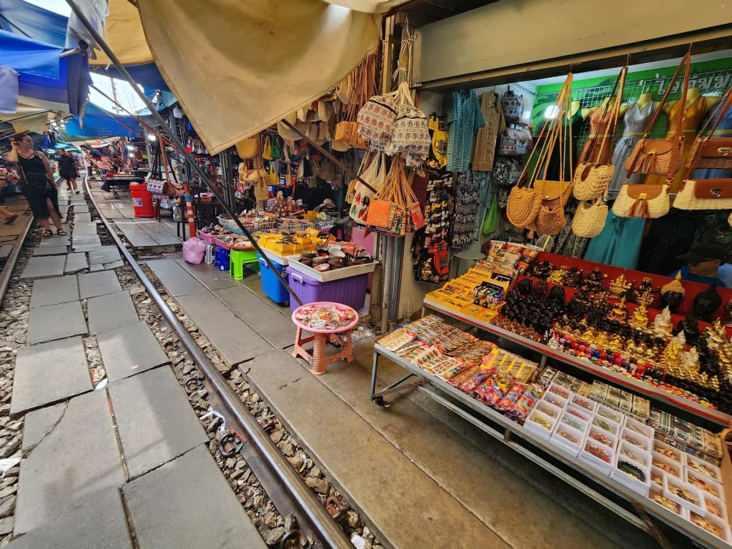 A close up of the busy market life on the rails