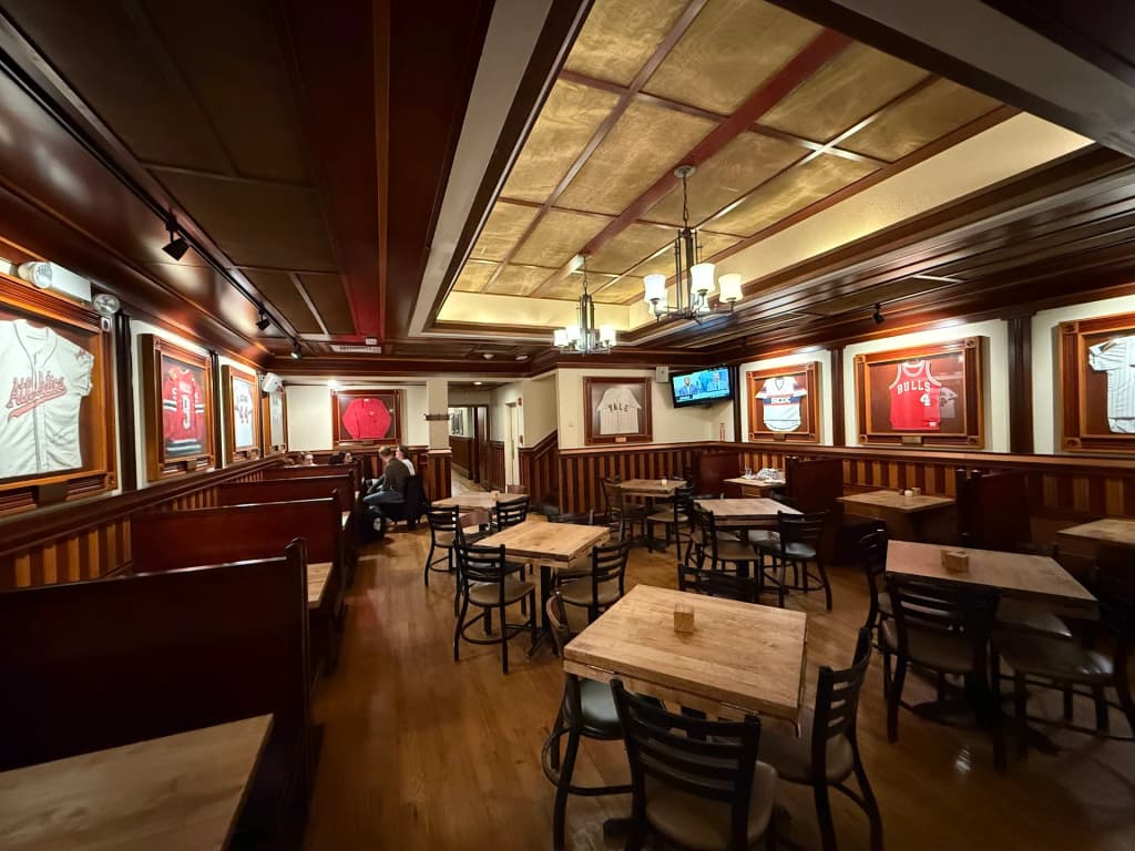 A deep dish pizza with a thick crust and rich tomato sauce at Lou Malnati's Pizzeria in Chicago
