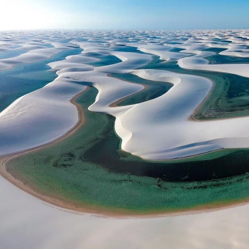 The surreal, undulating white dunes and crystal-blue lagoons of Lençóis Maranhenses National Park