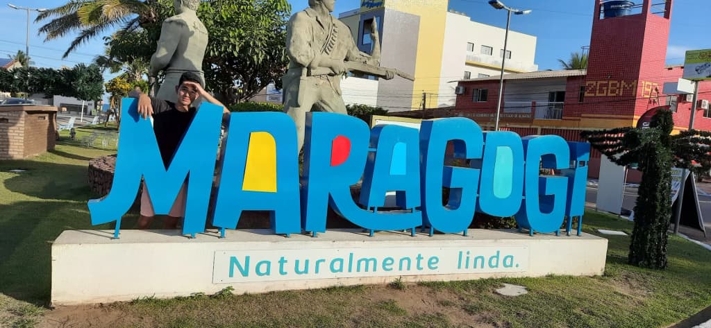 Aerial view of boats docked at Maragogi Natural pools showing water clarity