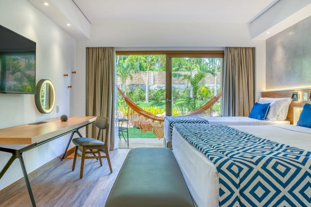 Guests enjoying the expansive pool area at Salinas Maragogi