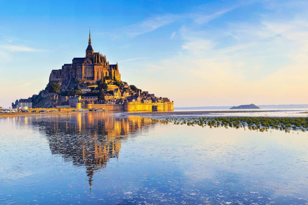 Aerial view of Mont Saint-Michel surrounded by tidal flats